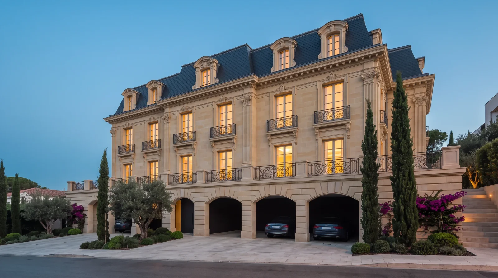 Boulevard Mansion — the arcade and the mansard roof at dusk