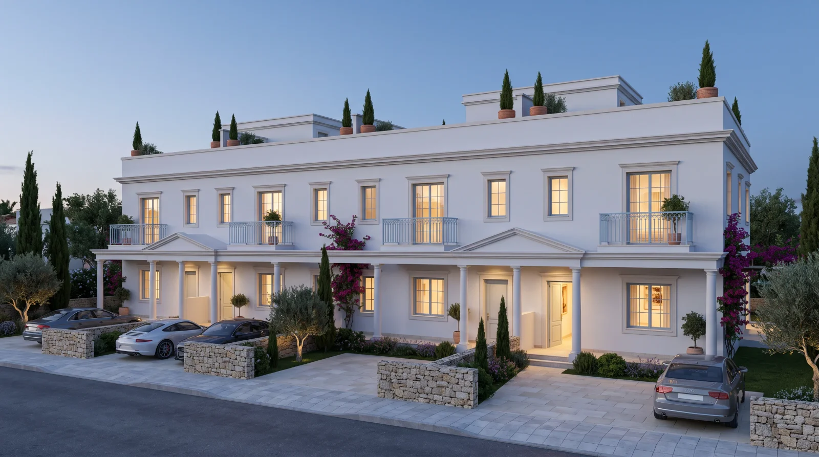 Portico Townhouses — the shared Ionic portico, a pediment over each front door