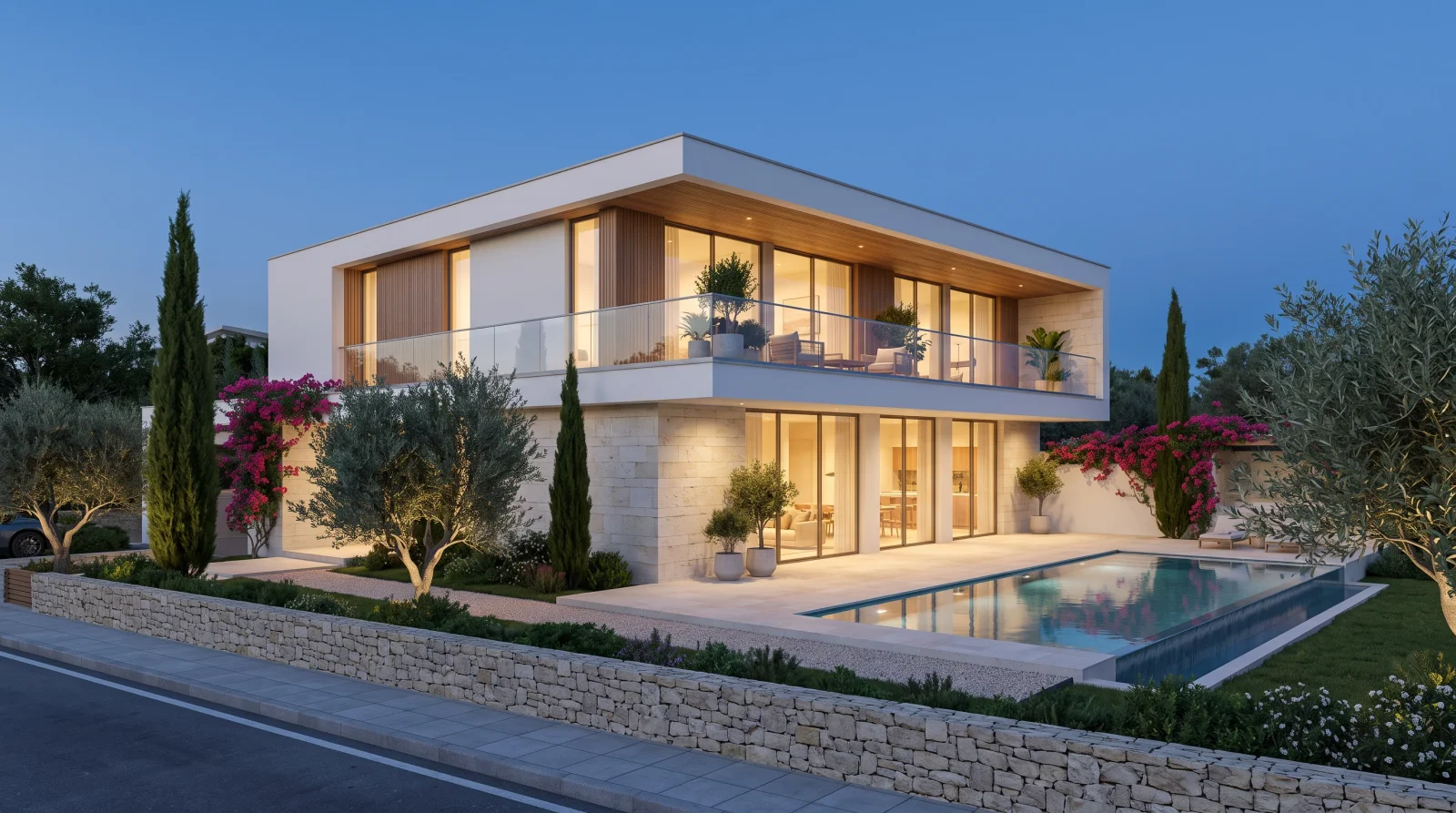 Pool Villa — the linear pool and the full-width upper terrace at dusk