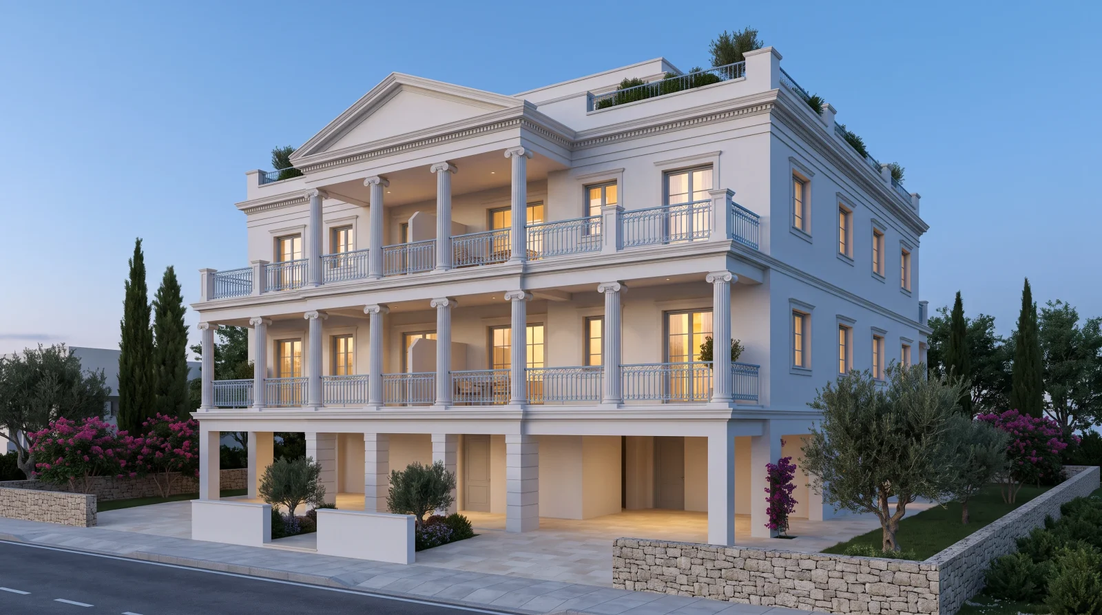 Ionic Residence — the two-storey colonnade and the central pediment at dusk