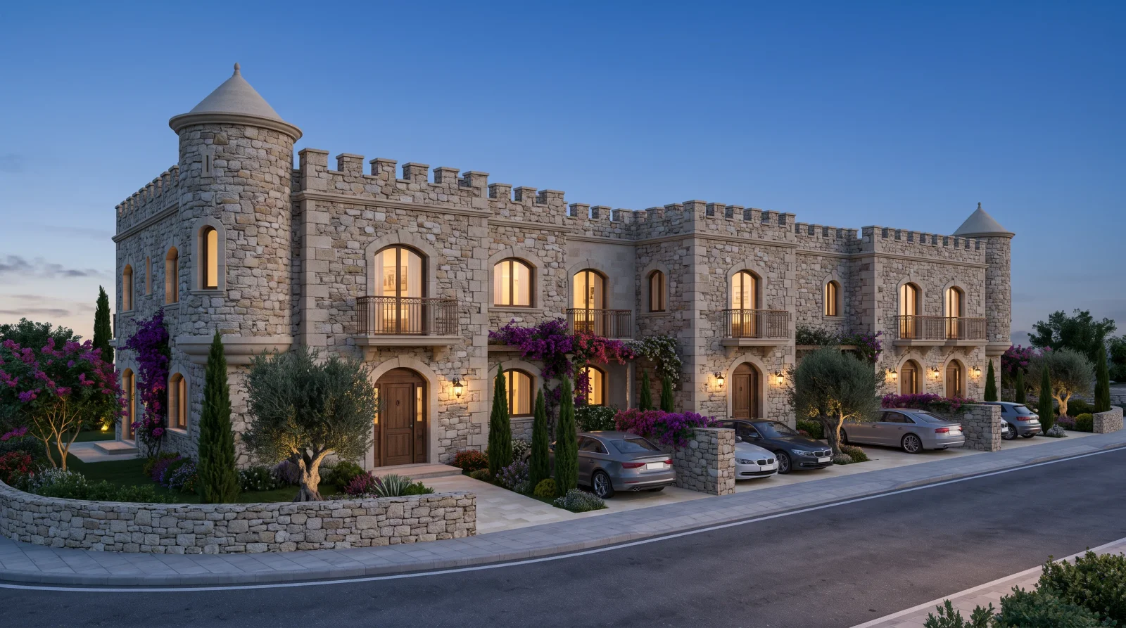 Castle Townhouses — the crenellated parapets and the end turrets at dusk